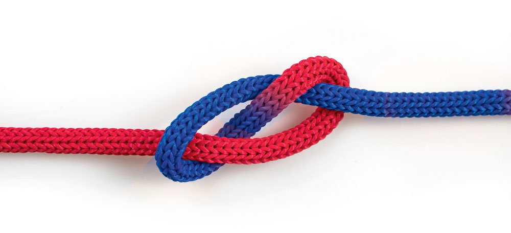 Ein Knoten in einem blau-roten Band