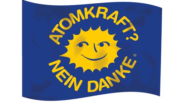 Grafik: eine blaue Fahne, auf der in gelber Schrift "Atomkraft nein Danke" steht